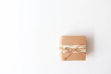 Brown paper gift box on white background. copy space, top view.