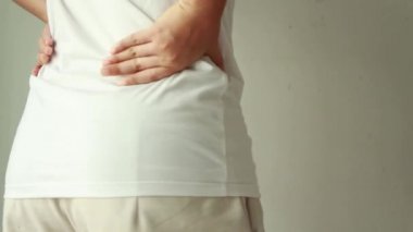Woman suffering from back ache, Healthcare and problem concept