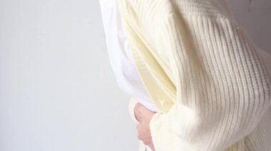 woman suffering from stomach ache, holding belly, feeling abdominal or menstrual pain or belly abdominal, diarrhea disease