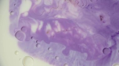 Soyut sıvı mürekkep boya dokusu. mor renkli girdap mermer arka plan. Saykodelik.