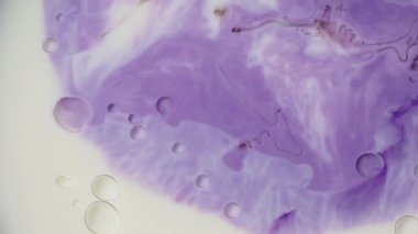 Soyut sıvı mürekkep boya dokusu. mor renkli girdap mermer arka plan. Saykodelik.