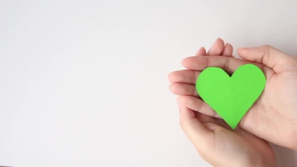 Hand Holding Green Heart White Background Love World Next Generation — Stock videók