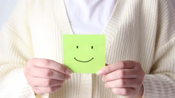 Woman Hands Holding Green Smile Face Paper Good Feedback Rating — Stockvideo