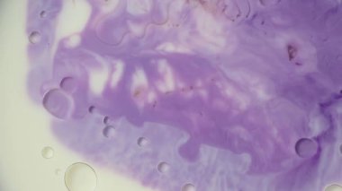 Soyut sıvı mürekkep boya dokusu. mor renkli girdap mermer arka plan. Saykodelik.