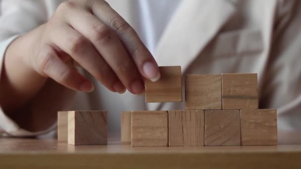 Hand Putting Wood Cube Top Wood Block Stacking Step Stair — 비디오