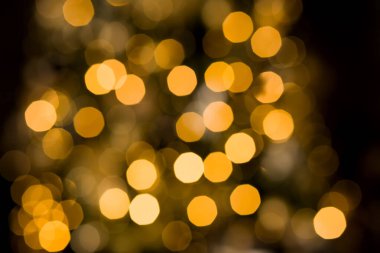 Soyut, bulanık altın bokeh arkaplan. Noel, tatil, yeni yıl konsepti 