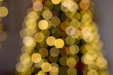 Soyut, bulanık altın bokeh arkaplan. Noel, tatil, yeni yıl konsepti 