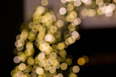 Soyut, bulanık altın bokeh arkaplan. Noel, tatil, yeni yıl konsepti 