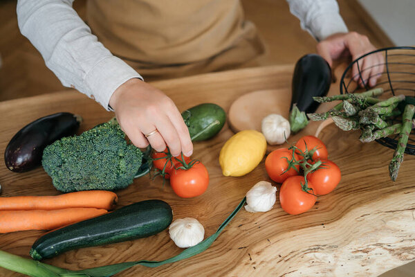 Organic eco food on local market close up. Farm fresh vegetables.Man chooses bell pepper