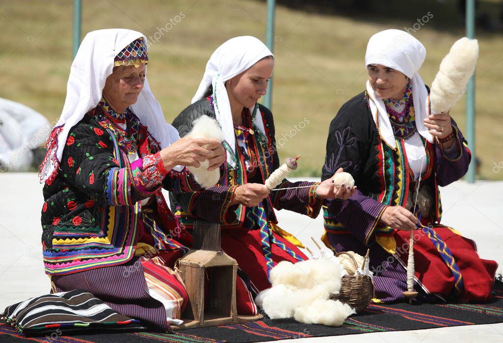 Koprivshtica, Bulgaria - August 6, 2022: People in traditional folk