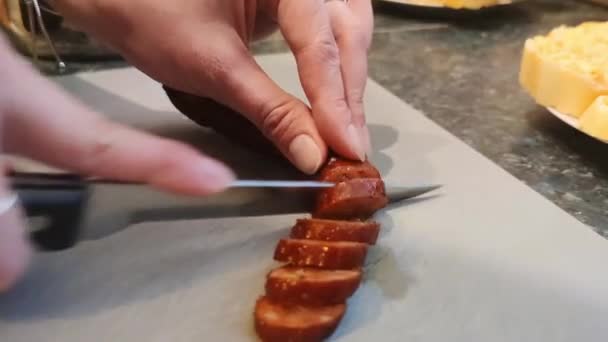 View Woman Hand Cutting Sausage Small Wheels — Stock Video
