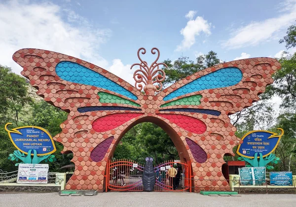 Main entrance to the Pandit Jawaharlal Nehru botanical garden decorated with a structure in the shape of a butterfly. Location : Nashik, Maharashtra, India. Date - June 26 2022
