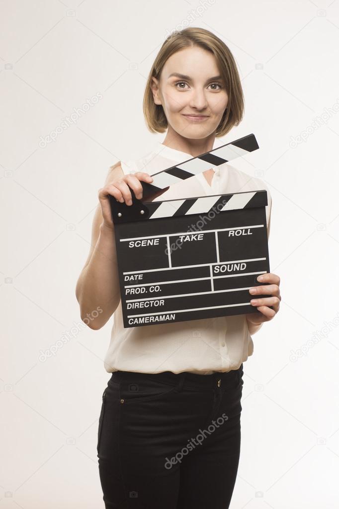 Young girl with a clapperboard cinema