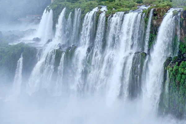 Iguazu waterfalls panoramic scenic view rainy weather . High quality photo
