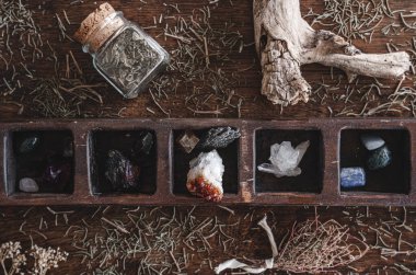 Flat lay shot of a collection of many different crystals on a messy wiccan witch's altar. Crystal magick clipart