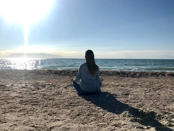 Beautiful girl taking break for meditation doing yoga exercise with amazing natural view, no stress, free, relief, balance, harmony, relaxing. Mindfulness meditation concept