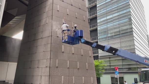 Cleaning Granite Building Pressure Washer Two Operators Work Safely Hard — Wideo stockowe