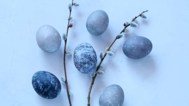 Easter food. Easter eggs in gray tones and sprigs of pussy willow — Stockvideo