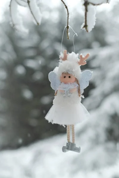 Winter angel.Christmas angel on a tree. Snow fairy. Christmas tree toy. — Stock Photo, Image