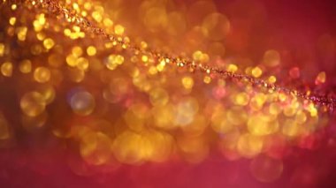Parlak Şenlik Geçmişi. Yılbaşı geçmişi. Işıldayan bokeh. Parlak bir arka plan. Düşen altın parıltısı dokusu. Yumuşak odak. Altın renkli güzel bokeh arkaplan.
