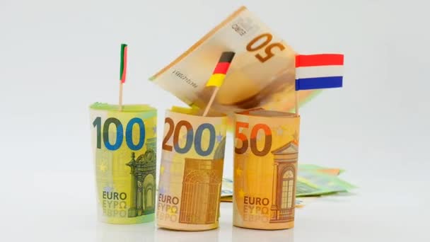 Economy of European countries.Flags of Germany, France and Italy and falling euro bills.money inflation.Changes in the budget of European countries. Inflation and economic recession in Europe. — Wideo stockowe