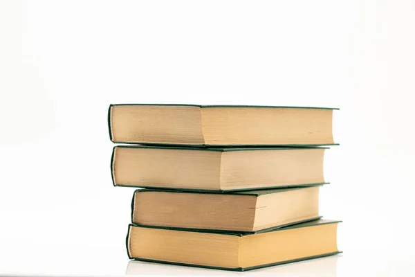 Books stack with green covers on a white background.Reading and education. Literature and reading — Stockfoto