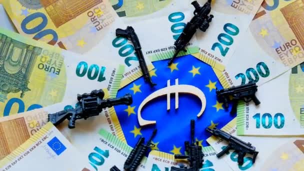 Weapons in Europe. Financing the supply of weapons, the army in Europe.firearms and euro bills. Rotation. Arms deliveries in the European Union.Military spending in European countries. — Wideo stockowe