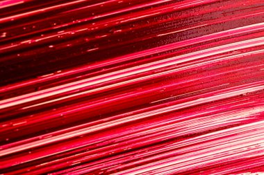 Kırmızı ruj makrosu. Ruj dokusu. Kırmızı ruj yüzeyi. Ruj arka planı. Makyaj ve kozmetik ürünleri. 