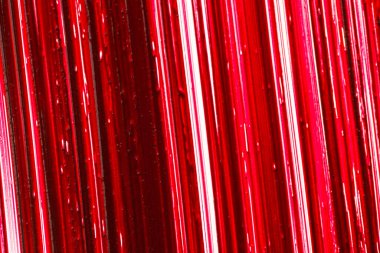 Ruj arkaplanı. Kırmızı ruj örneği. Makro. Kırmızı ruj yüzeyi. Makyaj ve kozmetik ürünleri. 