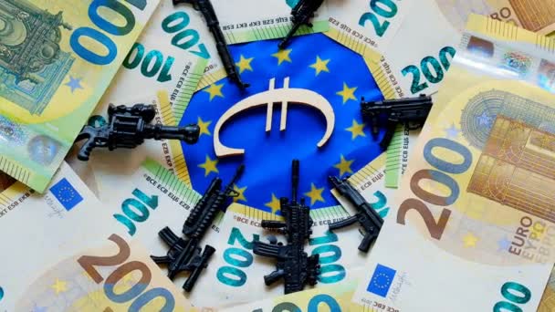 Weapons in Europe. Financing the supply of weapons, the army in Europe.firearms decorative and euro bills. Rotation. Arms deliveries in the European Union.Military spending in European countries. — Stockvideo