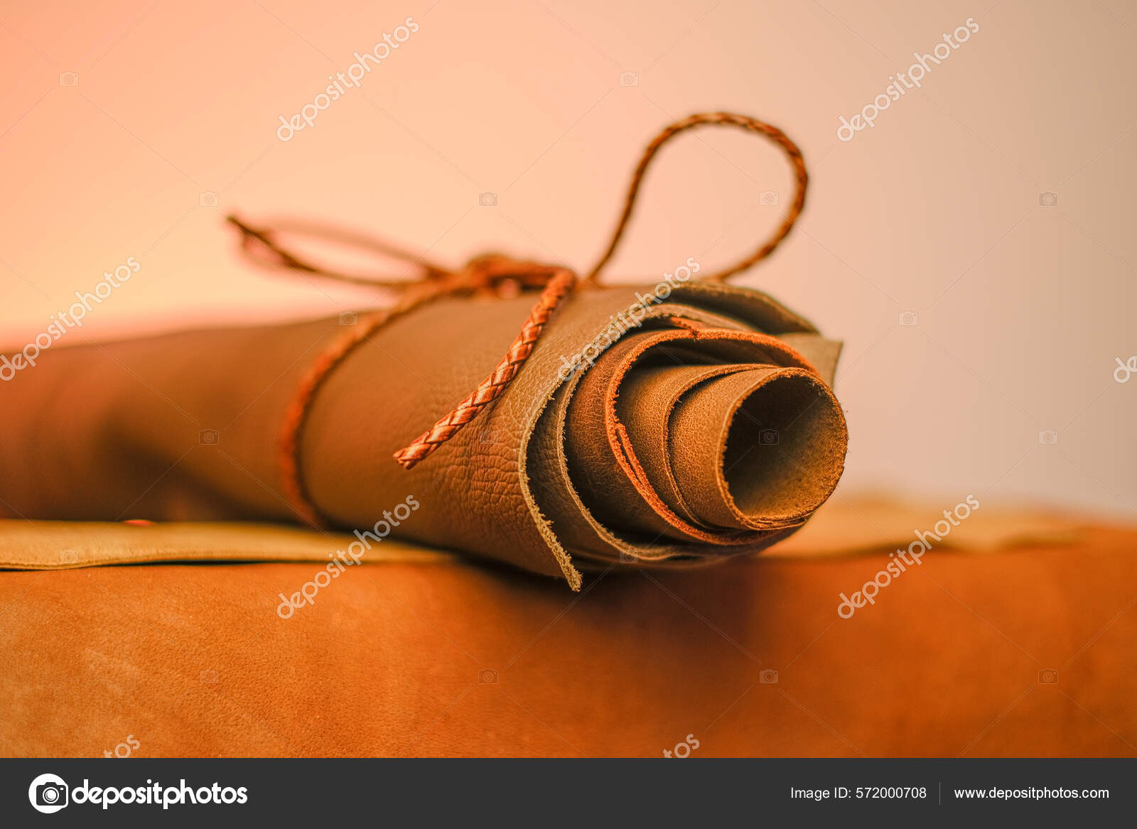 Rolls of brown leather. Selection of leather material. Genuine leather
