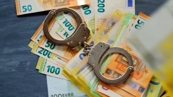 Economic Crimes Handcuffs Falling Euro Bills Footage — Vídeo de Stock