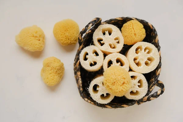 Sponges Loofah Washcloths Wicker Basket Light Beige Background Zero Waste — стоковое фото