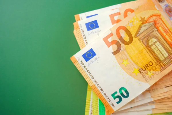 Spending Income European Countries Fifty Euros Banknotes Set Green Background — Zdjęcie stockowe