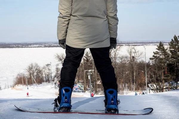 Rear View Man Standing His Back Snowboard Top Mountain Descending —  Fotos de Stock
