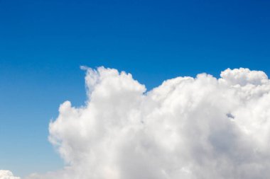 Clouds and blue sky view and landscape, from the helicopter, blue and white colors