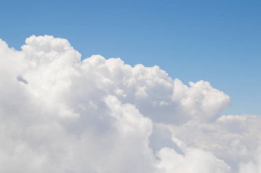 Clouds and blue sky view and landscape, from the helicopter, blue and white colors
