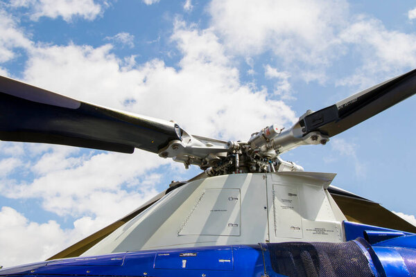 Helicopter close-up, blue and white helicopter view