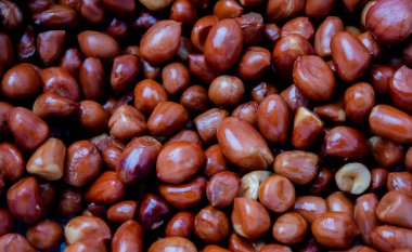 Kızarmış Fıstık Kızarmış Fıstık Tohumu arka planı, Asya usulü kızarmış fıstık, sokak yemeği. Zeytinyağında kızartma