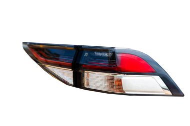 Arabanın arka farları beyaz arkaplandan ayrı.