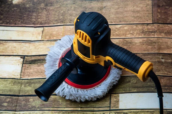 Rotary system electric polishing technology, adjustable around the machine on wooden floors. high resolution photography