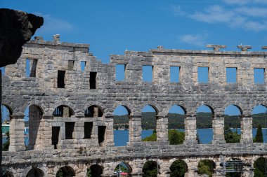 Pula, Croatia - July 12, 2022: The Pula Arena is a Roman amphitheater. It was constructed between 27 BC and AD 68 and is among the worlds six largest surviving Roman arenas