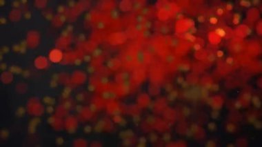 Soyut bulanık odaklanmış arkaplan, siyah üzerinde izole edilmiş ışıldayan kurgusal daireler.. 