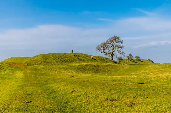 A view towards the entrance to the Iron Age Hill fort remains at Burrough Hill in Leicestershire, UK in early spring