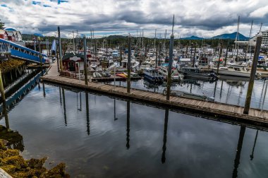 Reflections of a jetty in the marina in Ketchikan, Alaska in summertime