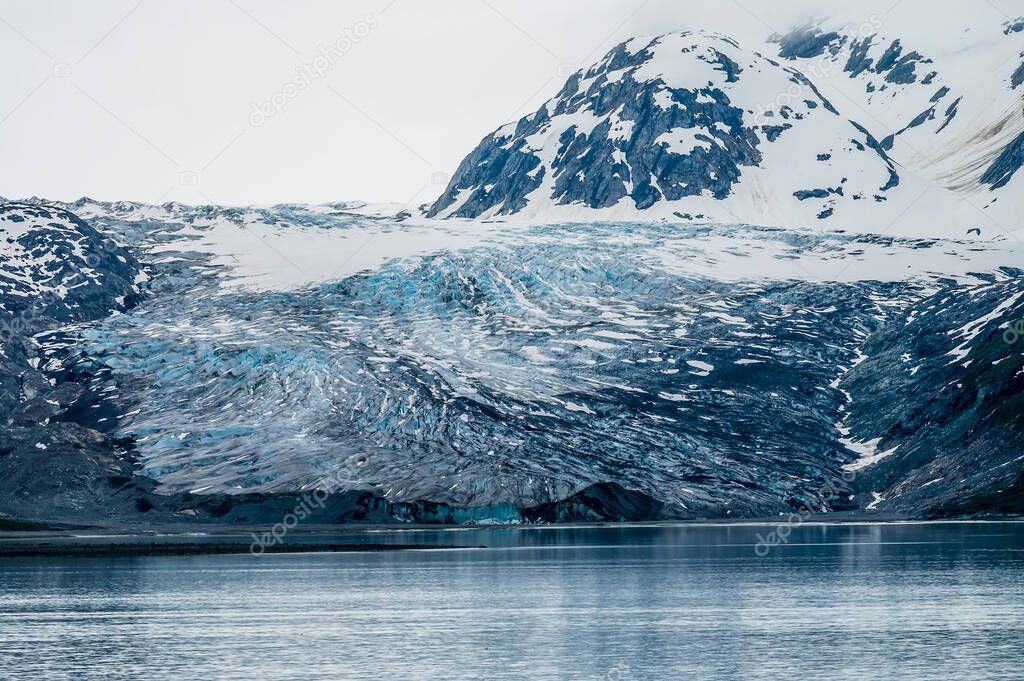 A close up view of the snout of the Margerie Glacier in Glacier Bay, Alaska in summertime