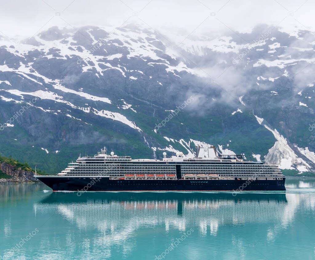 A view of a cruise ship in Glacier Bay, Alaska in summertime