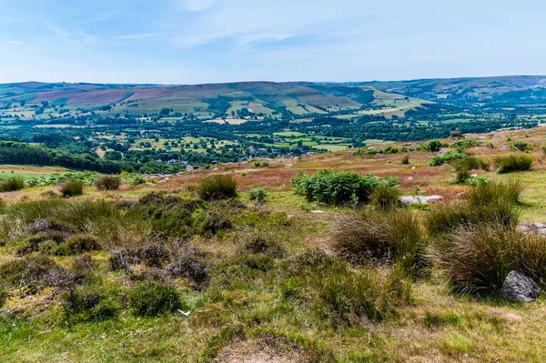 A view from the top of the Bamford Edge escarpment across the Hope Valley in summertime