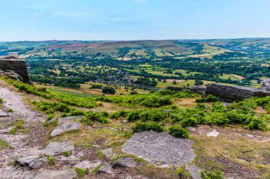 A view down the slopes towards Bamford from the top of Bamford Edge, UK in summertime