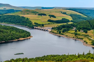 A view from top of Bamford Edge towards the side of Ladybower reservoir, UK in summertime
